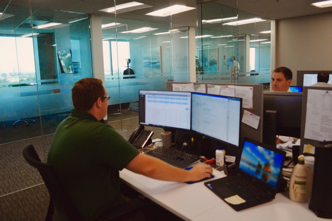 Velox Clearing operations team working at the office, clearing firm operations team, prime brokerage